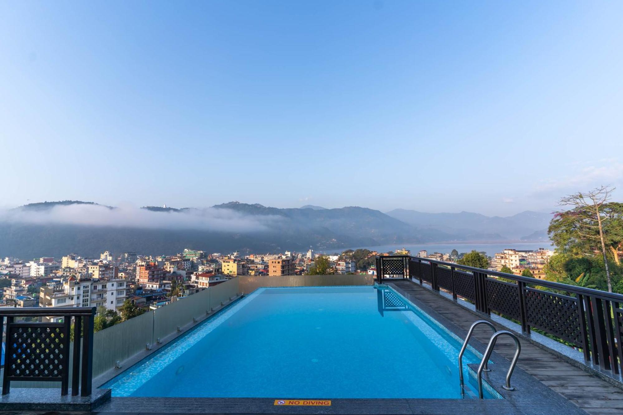 Bar Peepal Resort Pokhara Exterior foto View of the city from the hotel